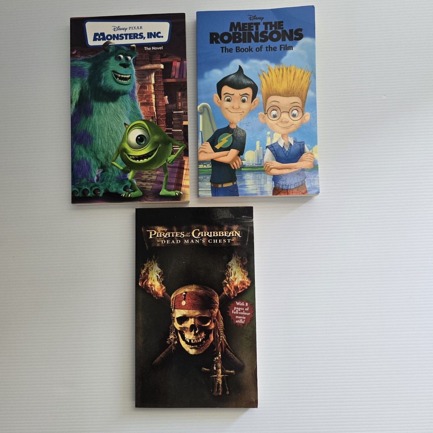 Alona.com.au 3x Disney Mixed Titles Books Monster Inc, Pirates Of Caribbean, Meet Robinsons