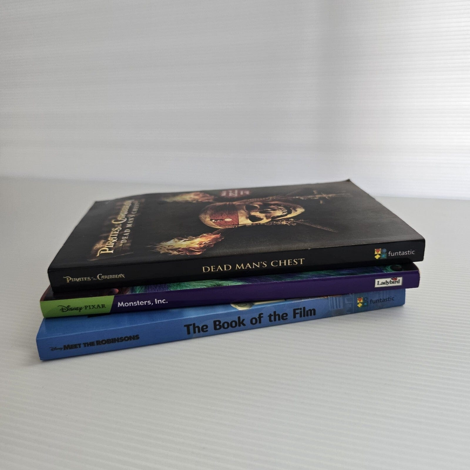 Alona.com.au 3x Disney Mixed Titles Books Monster Inc, Pirates Of Caribbean, Meet Robinsons